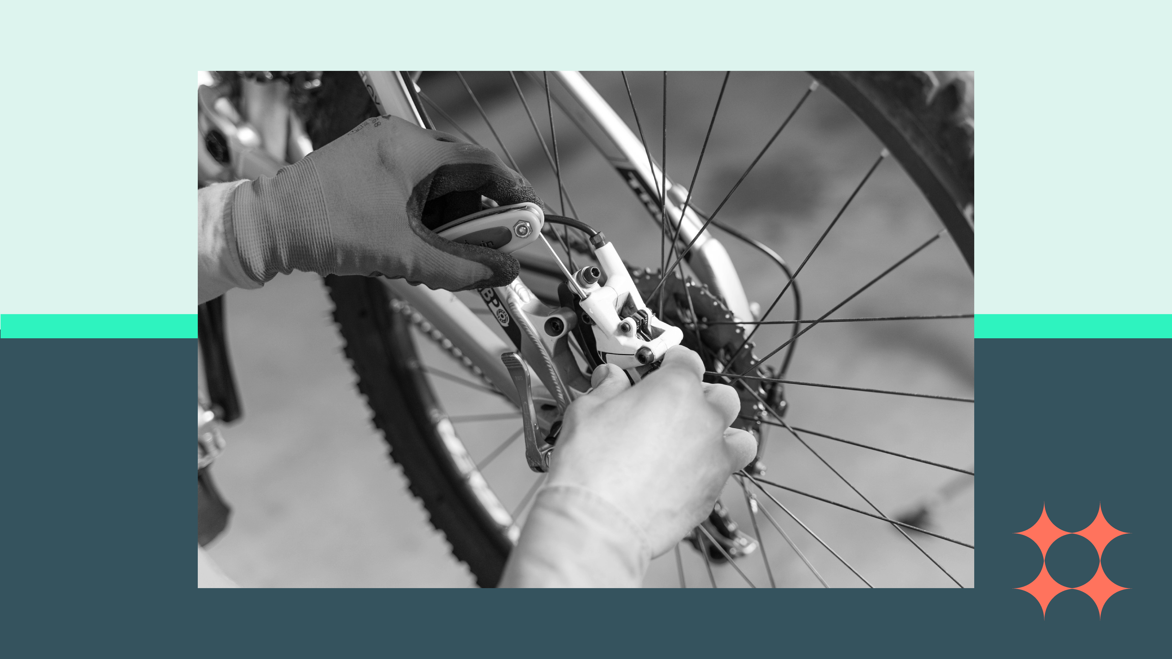 A bike repair professional working on the gears of a bicycle